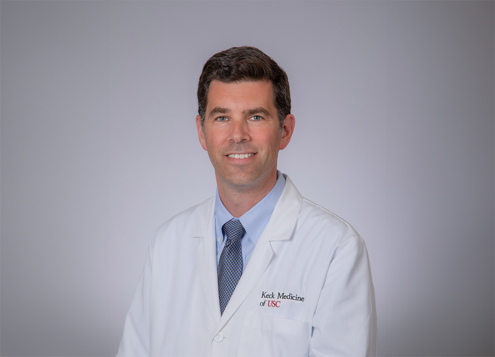 A portrait of Dr. William J. Mack.